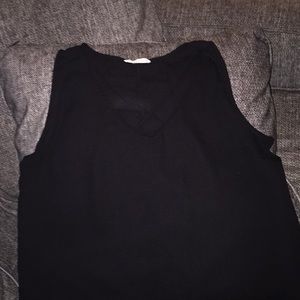 Black tank top with cross cross neckline